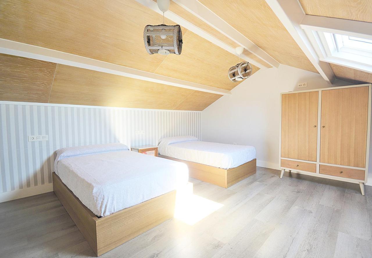 Galihost - Apartamentos Mamuela Ribadumia ภายนอก รูปภาพ